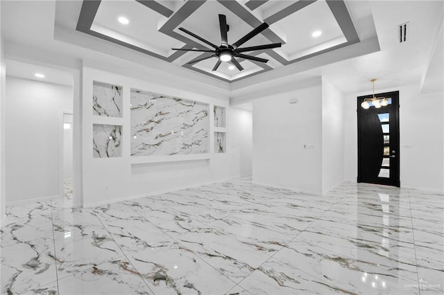 unfurnished living room featuring coffered ceiling, a notable chandelier, visible vents, and recessed lighting