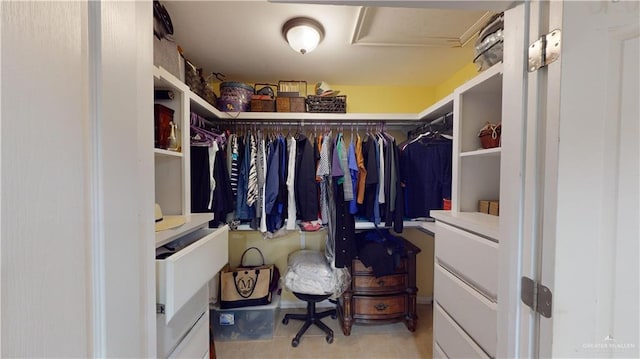 walk in closet featuring light tile patterned floors