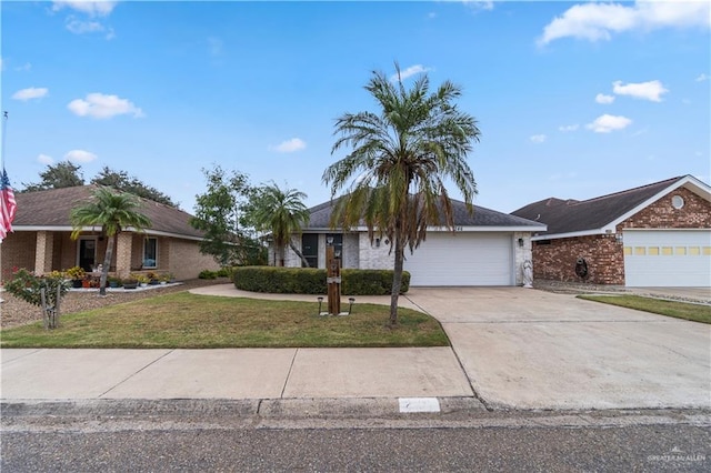 single story home featuring a front lawn and a garage