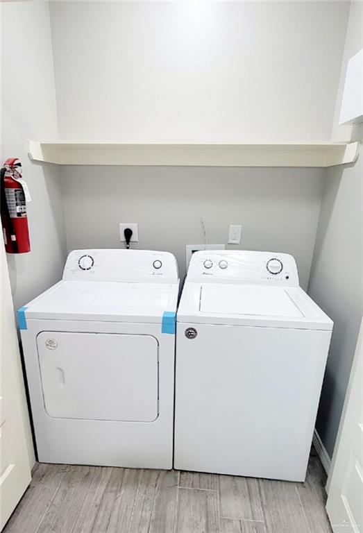 washroom featuring separate washer and dryer