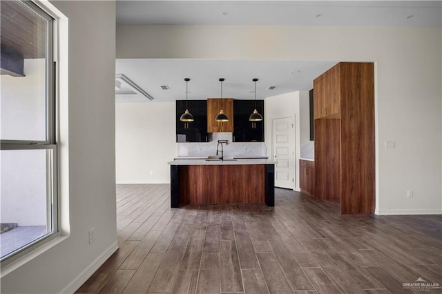 kitchen with sink and hanging light fixtures