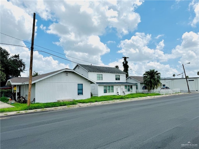 view of front of property with fence