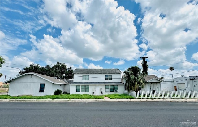 view of front of home with fence