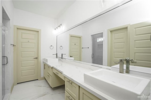 bathroom featuring vanity and a shower with door