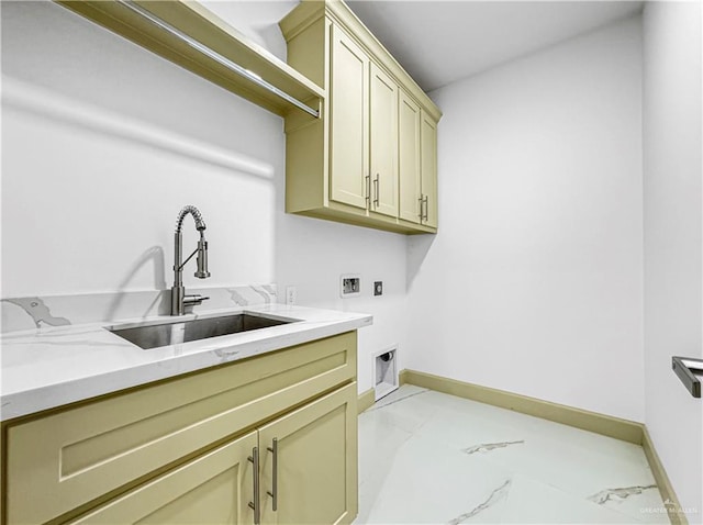 2613 Linva Ave, Edinburg, TX 78539 - laundry area featuring hookup for a washing machine, cabinet space, light marble finish flooring, and electric dryer hookup