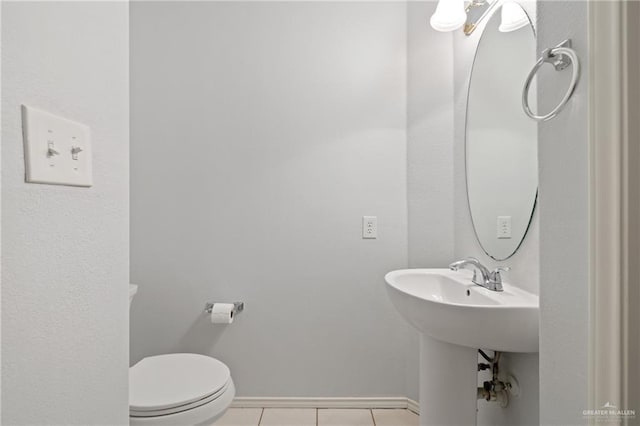 2504 Grayson Ave, Mcallen, TX 78504 - bathroom with tile patterned flooring and toilet