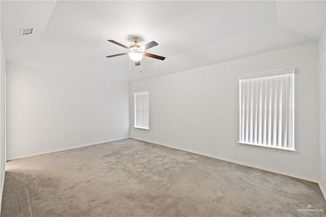 2504 Grayson Ave, Mcallen, TX 78504 - spare room featuring carpet floors, a ceiling fan, and vaulted ceiling