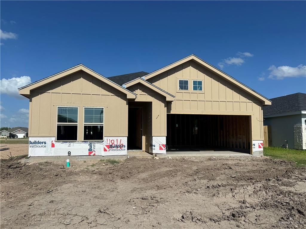 4816 S Landon Ave, Edinburg, TX 78539 - unfinished property with a garage and board and batten siding