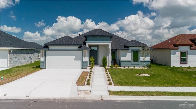 view of front of house with a front lawn and a garage