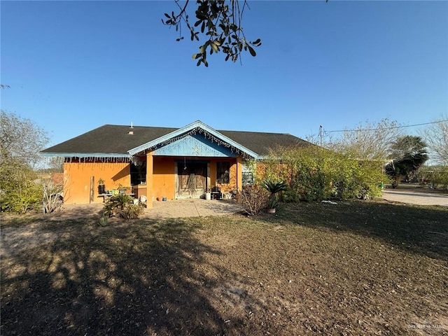 view of front of home featuring stucco siding