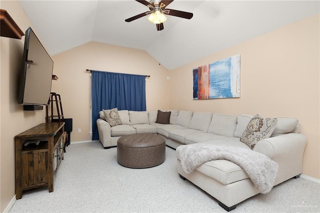 living room featuring vaulted ceiling and ceiling fan