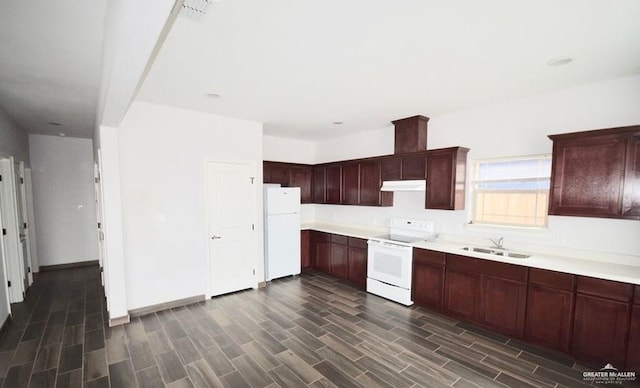 kitchen featuring sink and white appliances