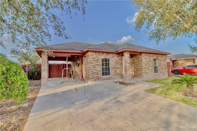 2800 Del Oro Dr, Mission, TX 78572 - back of property featuring fence and brick siding