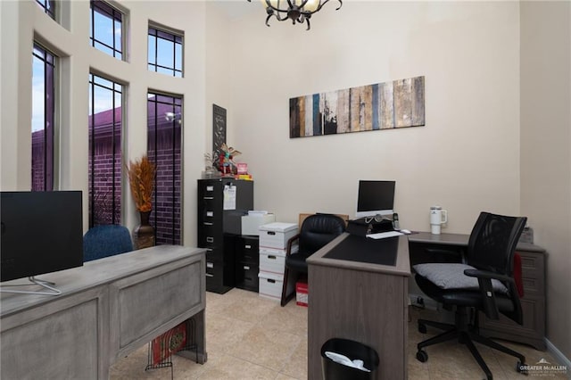 tiled office with an inviting chandelier