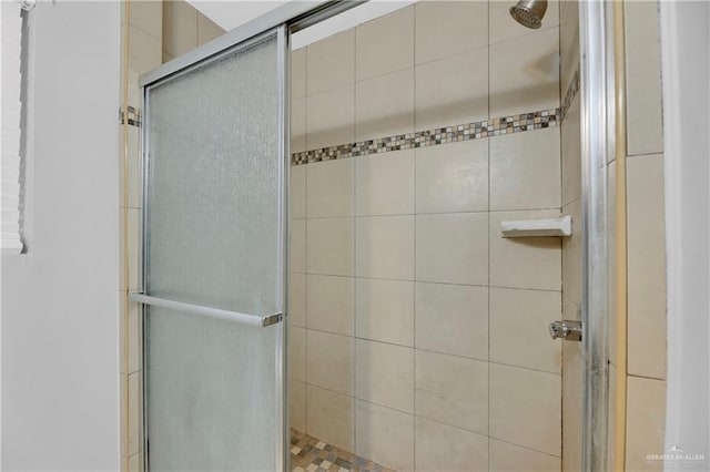 bathroom with an enclosed shower