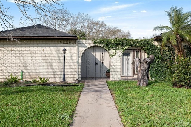 view of outdoor structure with a lawn