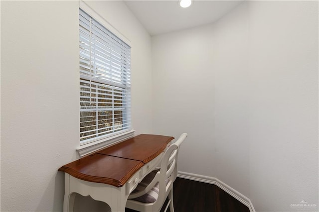 unfurnished office featuring wood-type flooring