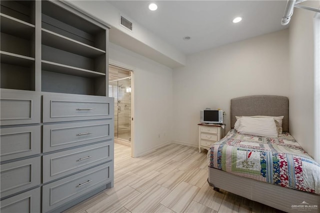 bedroom with ensuite bath