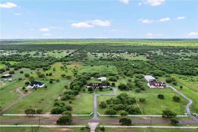 birds eye view of property featuring a rural view