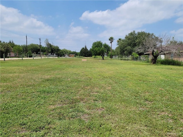 view of yard featuring fence