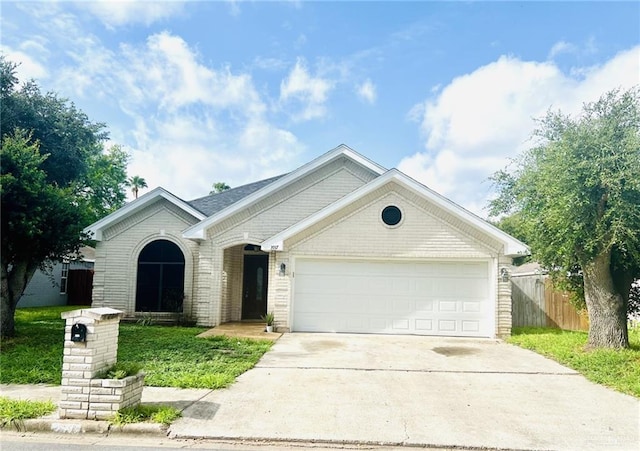 single story home featuring a garage