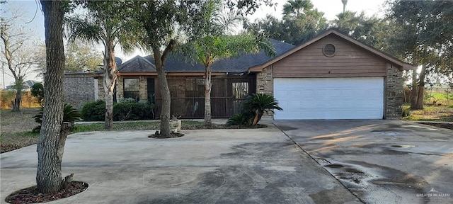 single story home with a garage