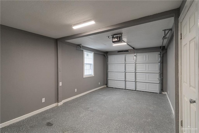 501 W Iowa St, Harlingen, TX 78552 - garage with a garage door opener and baseboards