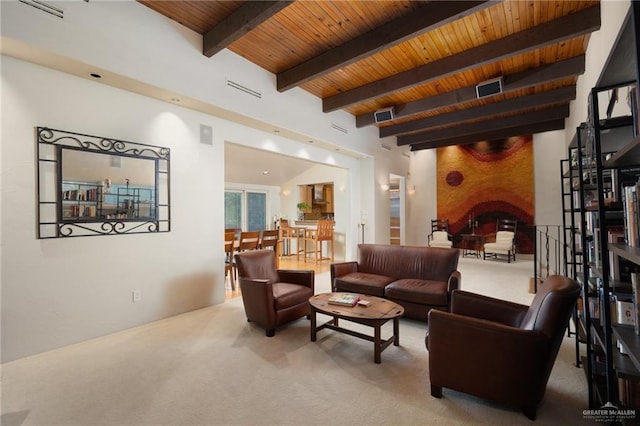 living room featuring carpet floors, wooden ceiling, and beam ceiling