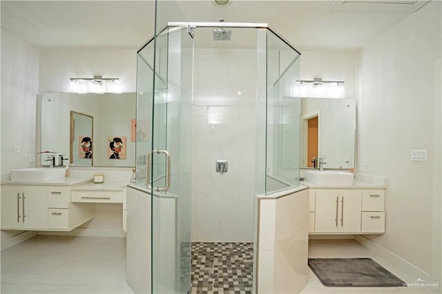 2008 S Erica St, Pharr, TX 78577 - bathroom with a shower stall and two vanities