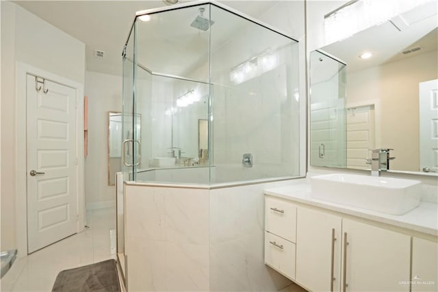 2008 S Erica St, Pharr, TX 78577 - full bath featuring a shower stall, vanity, and tile patterned flooring