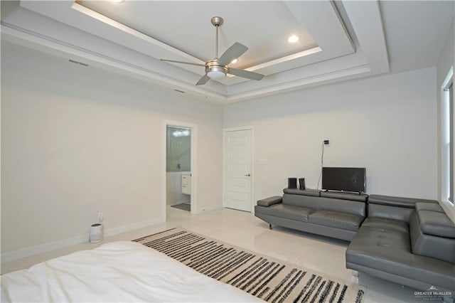 2008 S Erica St, Pharr, TX 78577 - tiled bedroom featuring a raised ceiling, recessed lighting, ensuite bathroom, ceiling fan, and baseboards