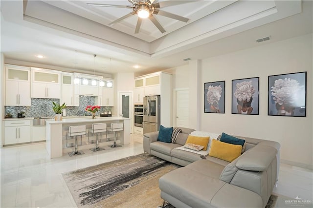 2008 S Erica St, Pharr, TX 78577 - living area featuring ceiling fan, recessed lighting, and a raised ceiling