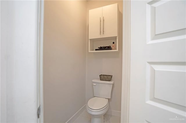 2008 S Erica St, Pharr, TX 78577 - bathroom featuring toilet and baseboards