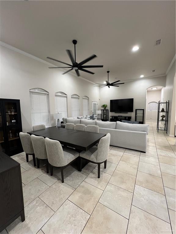 5809 N 3rd St, Mcallen, TX 78504 - dining space featuring crown molding, ceiling fan, light tile patterned floors, and recessed lighting