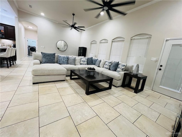 5809 N 3rd St, Mcallen, TX 78504 - living area with ceiling fan, ornamental molding, light tile patterned floors, recessed lighting, and arched walkways