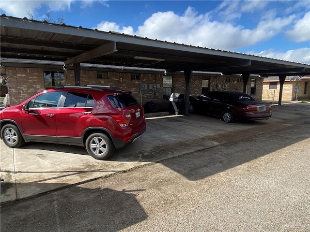 view of car parking featuring a carport