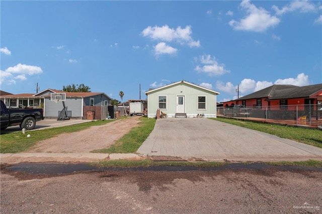 3411 Juan St, Edinburg, TX 78541 - view of front of house featuring driveway and a residential view