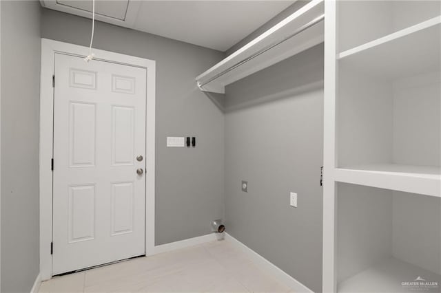 laundry room with light tile patterned floors and hookup for an electric dryer