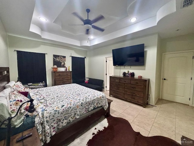 816 Leal St, Mission, TX 78572 - bedroom featuring recessed lighting, visible vents, light tile patterned floors, and a raised ceiling
