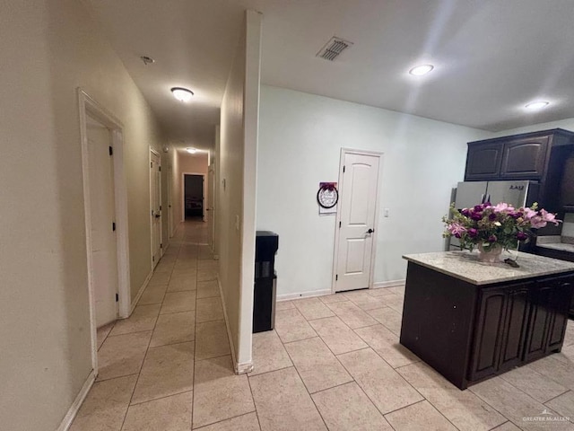 816 Leal St, Mission, TX 78572 - kitchen featuring baseboards, recessed lighting, light tile patterned flooring, and visible vents