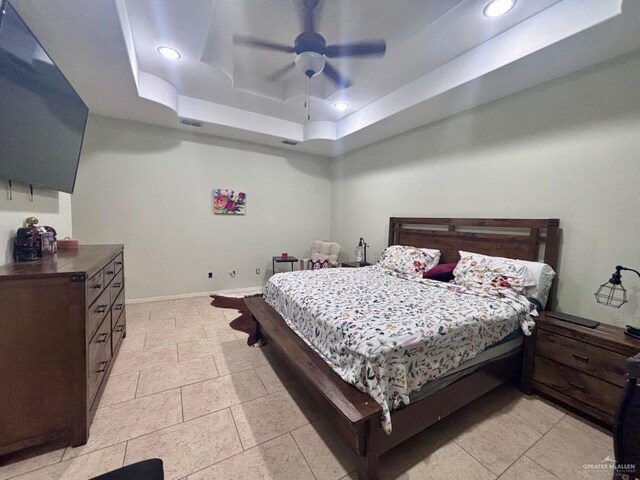 816 Leal St, Mission, TX 78572 - bedroom featuring recessed lighting, baseboards, a ceiling fan, and a raised ceiling