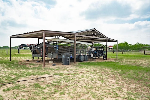 exterior space with a detached carport and an outdoor structure