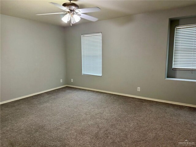 4717 Violet Ave, Mcallen, TX 78504 - unfurnished room with baseboards, ceiling fan, and dark colored carpet