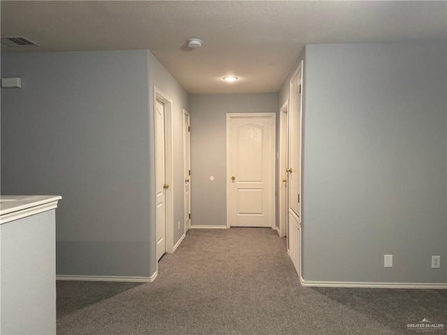 4717 Violet Ave, Mcallen, TX 78504 - hall with carpet floors, baseboards, and visible vents