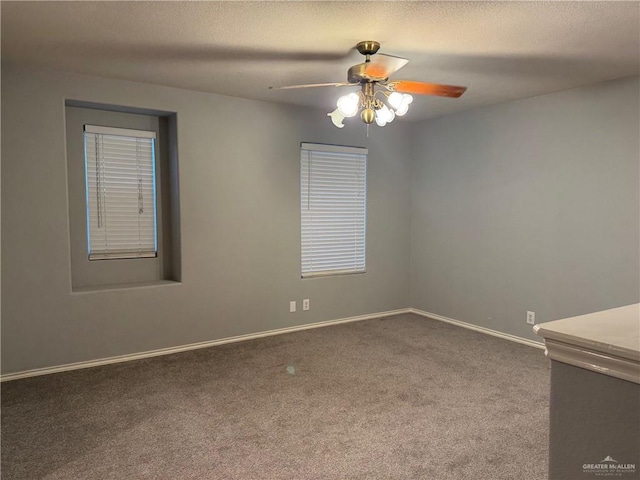 4717 Violet Ave, Mcallen, TX 78504 - unfurnished room featuring carpet floors, ceiling fan, and baseboards