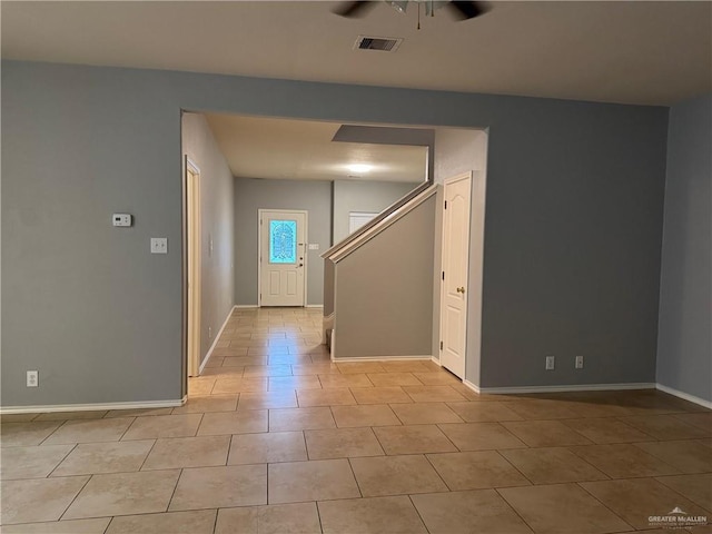 4717 Violet Ave, Mcallen, TX 78504 - spare room with baseboards, ceiling fan, visible vents, and light tile patterned floors
