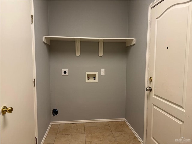 4717 Violet Ave, Mcallen, TX 78504 - clothes washing area with washer hookup, laundry area, electric dryer hookup, baseboards, and light tile patterned flooring