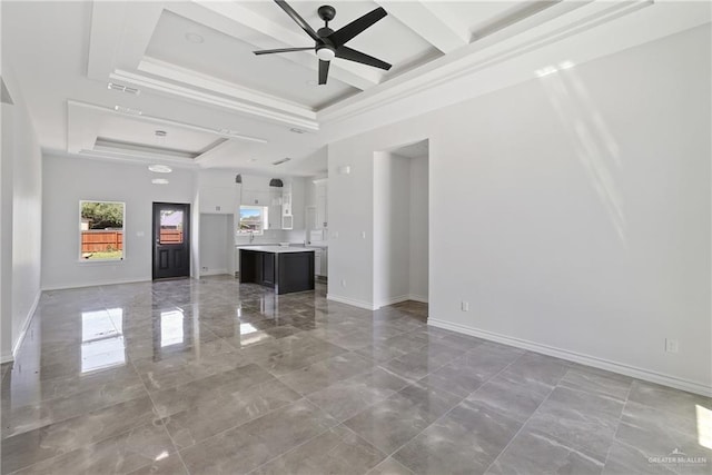 1003 Short Rd, San Juan, TX 78589 - unfurnished living room featuring marble finish floor, a raised ceiling, visible vents, a ceiling fan, and baseboards