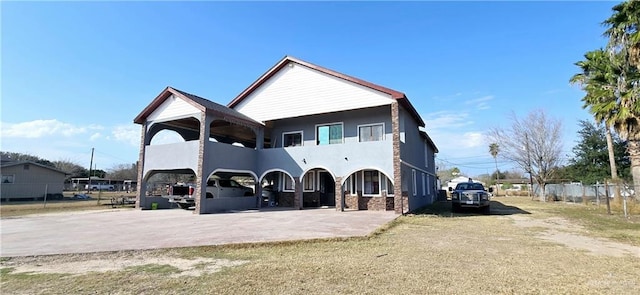 view of front of home with a patio