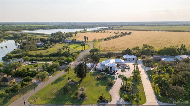 aerial view featuring a rural view and a water view